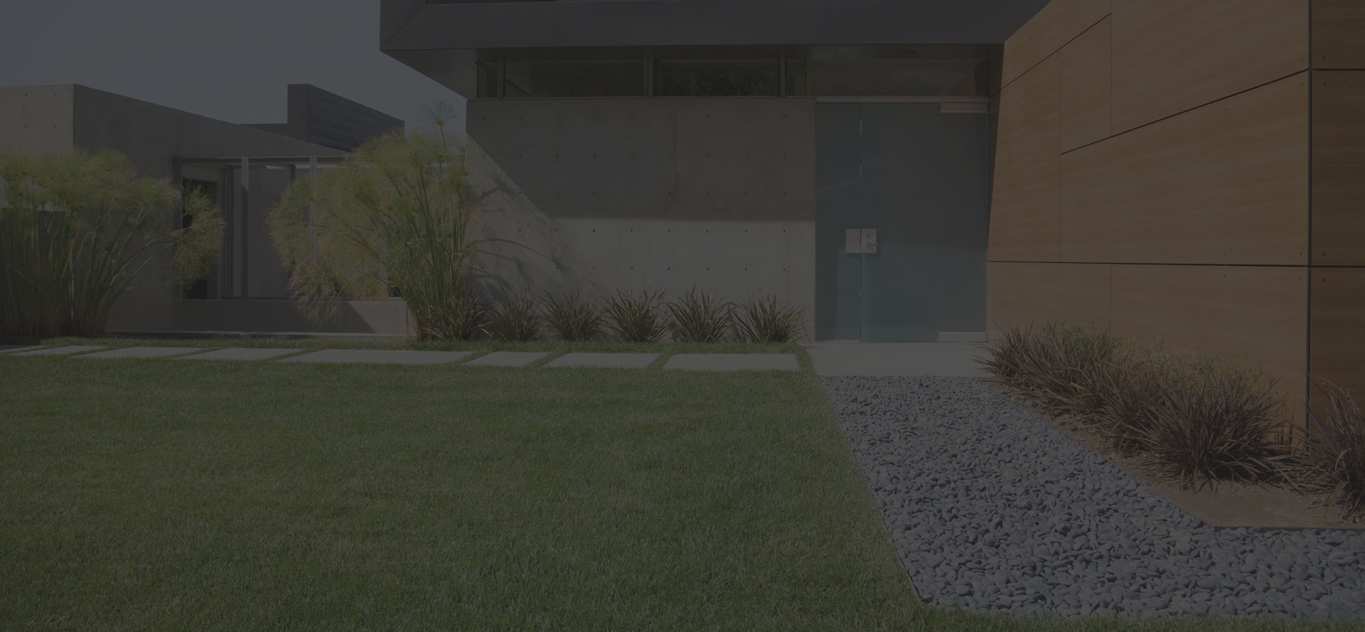 Landscaped Adelaide garden with lawn, paving and retaining walls
