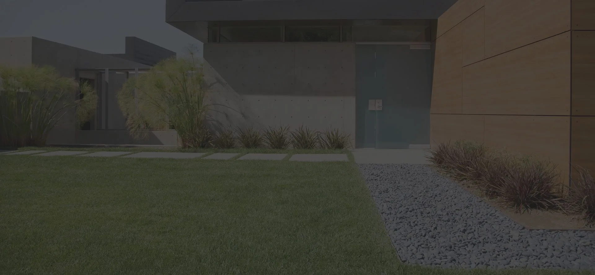 Landscaped Adelaide garden with lawn, paving and retaining walls